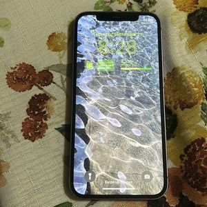 It works its old and the back is cracked it includes a charger and a case